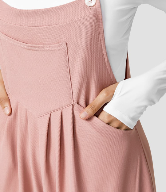 Dunja - Trousers with adjustable buttons on the straps