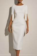 White dress with beige accents worn by a model against a neutral background