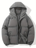 Gray puffer jacket with a hood on a white background
