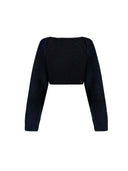 Black ribbed sweater with long sleeves on a white background