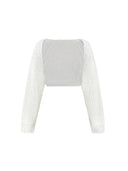 White ribbed knit shrug on a white background