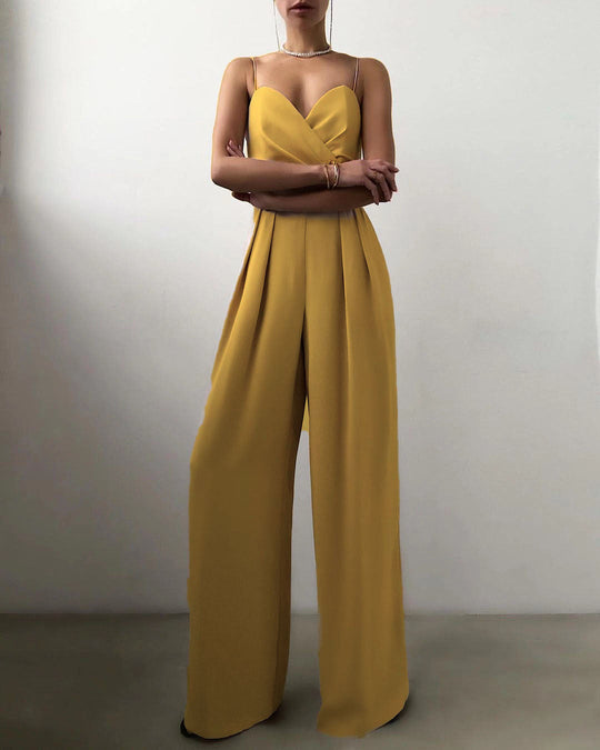 Yellow jumpsuit worn by a person on a plain background