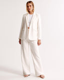 Claudine – Plissierte Hose mit hohem Bund und maßgeschneiderter Passform