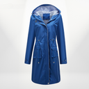 Blue raincoat on a white background