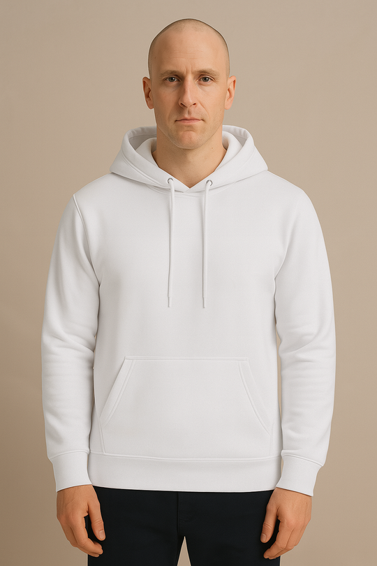 Man wearing a plain white hoodie on a beige background