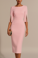 Pink dress with embellished sleeves on a beige background