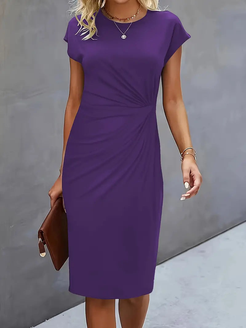 Purple dress worn by a person against a gray background