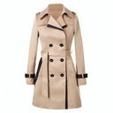 Beige trench coat with black accents on a white background