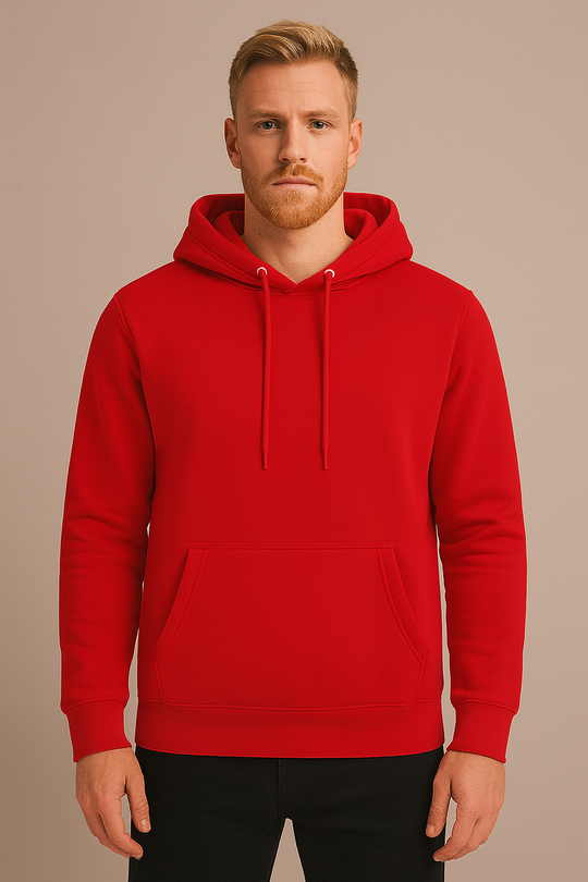 Man wearing a red hoodie against a beige background