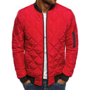 Red quilted jacket with black accents on a white background