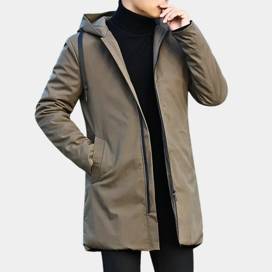 Khaki hooded coat worn by a person on a light gray background