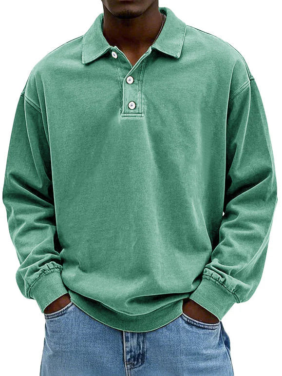Green long-sleeve polo shirt worn by a person on a white background