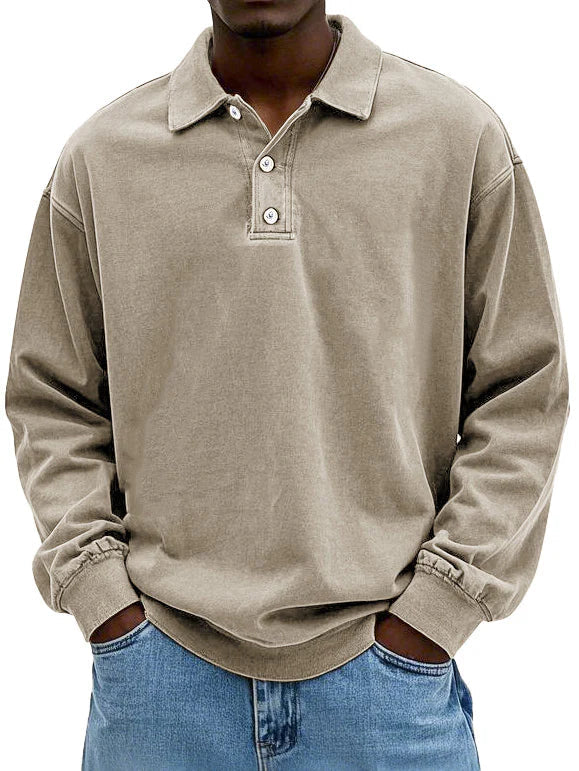 Beige long-sleeve polo shirt worn by a person on a white background