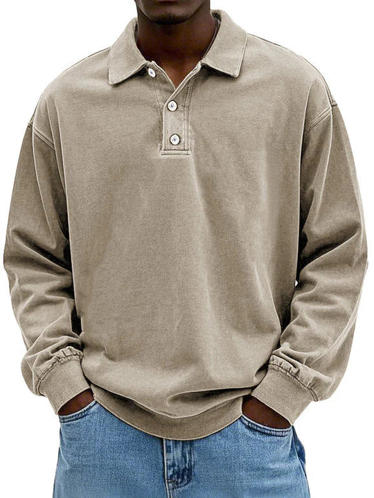 Beige long-sleeve polo shirt worn by a person on a white background